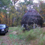 exterior of Shivar Spring Company building and pickup truck