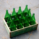 image of green Shivar Spring bottles in crate